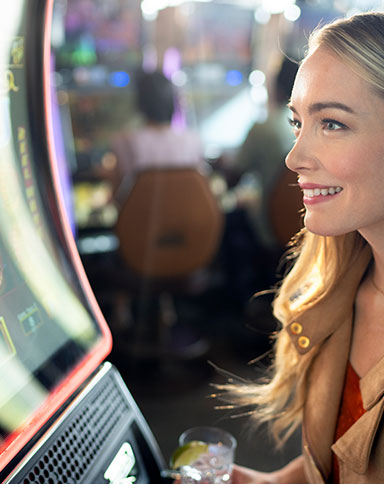 woman at slot machine image